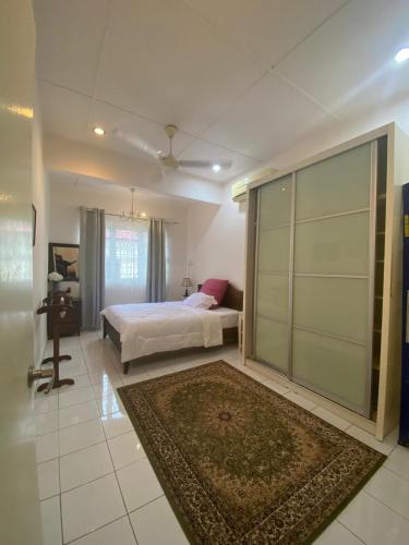 En eller flere senge i et værelse på Laman Qurattu A'yun