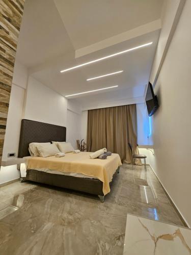 Postel nebo postele na pokoji v ubytování Casa Blue Sarantis