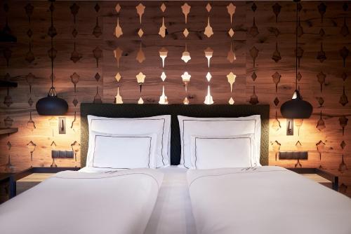 Postel nebo postele na pokoji v ubytování Der Böglerhof - pure nature spa resort