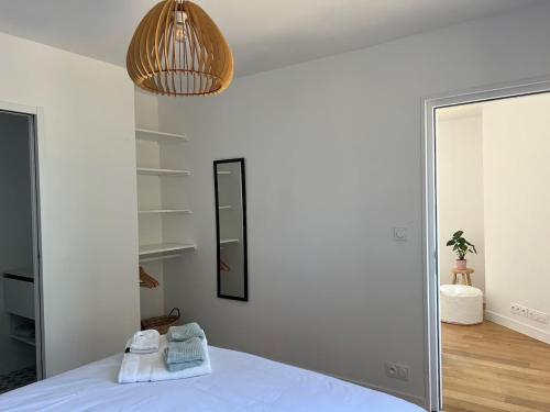 Postel nebo postele na pokoji v ubytování Charmante villa neuve à 150 m de la plage