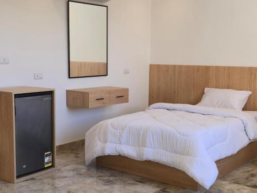 Postel nebo postele na pokoji v ubytování Nakhil Pyramids Resort