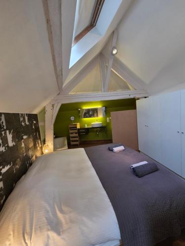 Ένα ή περισσότερα κρεβάτια σε δωμάτιο στο Strole's House