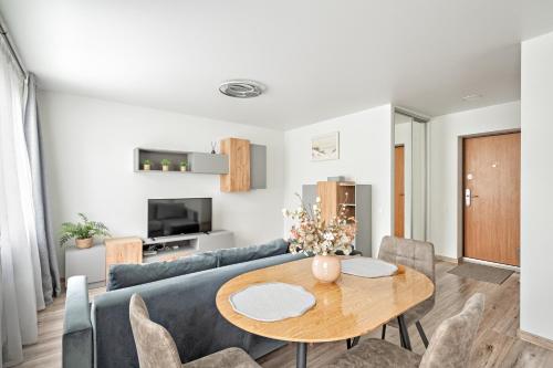 TV a/nebo společenská místnost v ubytování Cozy Studio