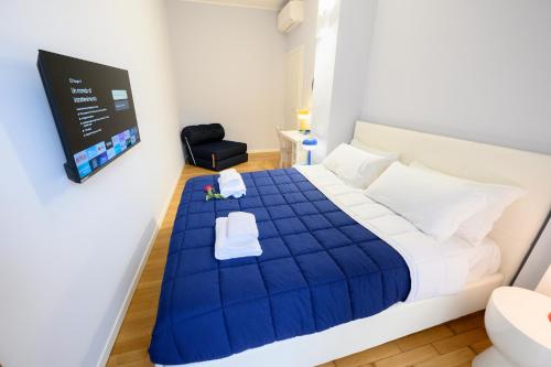 Ένα ή περισσότερα κρεβάτια σε δωμάτιο στο Suite Luca-Central Luxury Suite