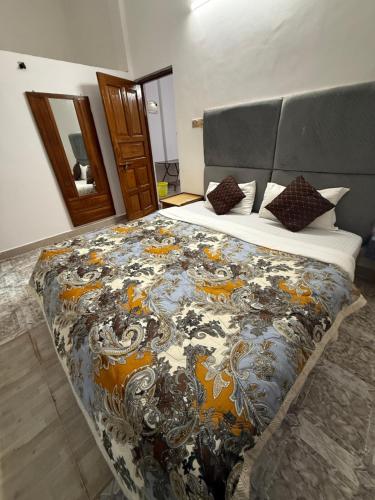 Ένα ή περισσότερα κρεβάτια σε δωμάτιο στο Antonio's guest house