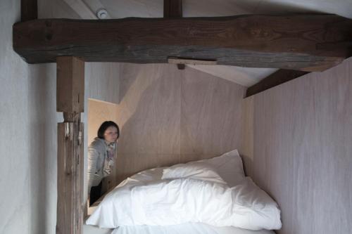 Postel nebo postele na pokoji v ubytování Shizuya KYOTO