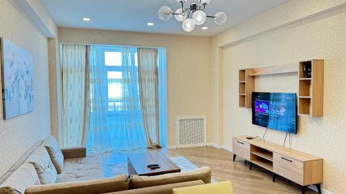 Μια τηλεόραση ή/και κέντρο ψυχαγωγίας στο Apartments on Nizami Mall