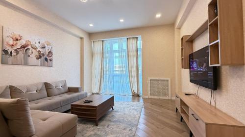 Μια τηλεόραση ή/και κέντρο ψυχαγωγίας στο Apartments on Nizami Mall