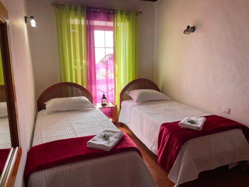 Ένα ή περισσότερα κρεβάτια σε δωμάτιο στο La bodega de Jorge