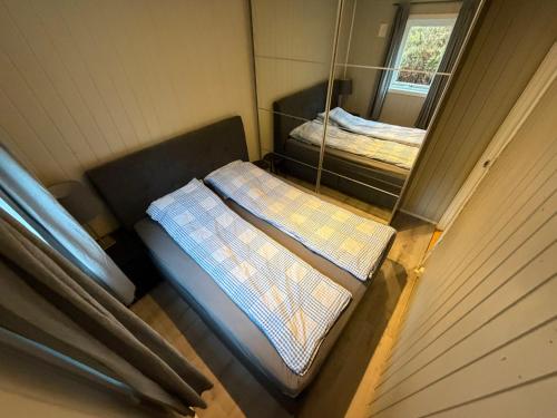 Postel nebo postele na pokoji v ubytování Beautiful panorama fjord wiew 40 min from Bergen