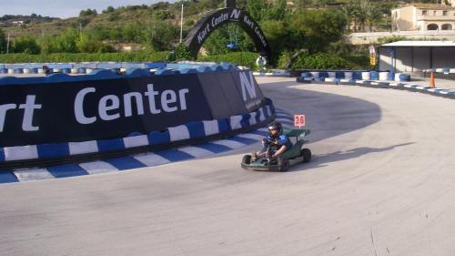 a child riding a toy car on a track at Calamora-Moraira in Moraira