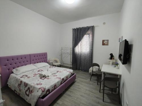 Postel nebo postele na pokoji v ubytování CarpeDiemHouse