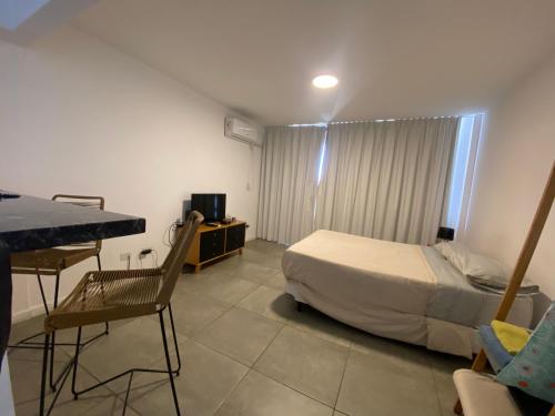 Ένα ή περισσότερα κρεβάτια σε δωμάτιο στο Monoambiente vista al Rio