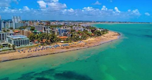 an aerial view of a beach and the ocean at Flat 201 Paradise in João Pessoa
