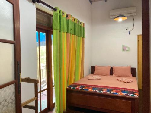 Кровать или кровати в номере Aran Villa Yala