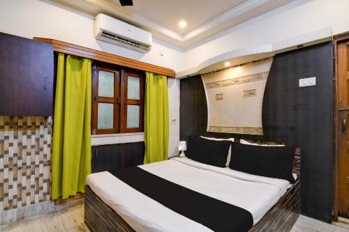 Postel nebo postele na pokoji v ubytování Hotel O Avenue Villa