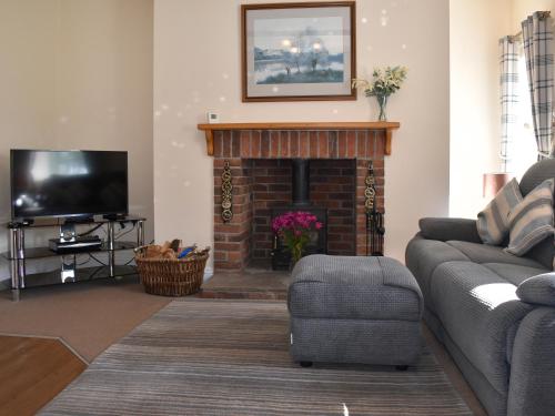 TV a/nebo společenská místnost v ubytování High Tide