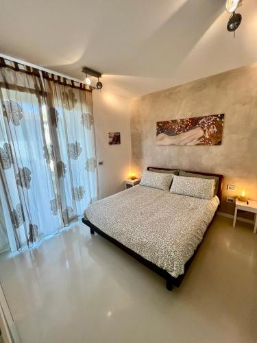 Postel nebo postele na pokoji v ubytování RIMINI Urban Suite Apartament