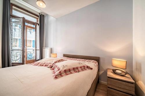 Llit o llits en una habitació de Le Central Evian