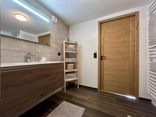 Koupelna v ubytování Homency - Résidence Fermes de l'Alpe C403