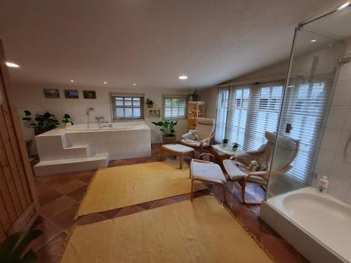 Ένα μπάνιο στο Wellness B&B Het Wapserhofje