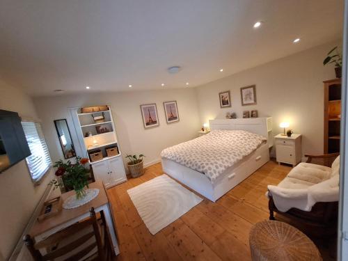 Ένα ή περισσότερα κρεβάτια σε δωμάτιο στο Wellness B&B Het Wapserhofje