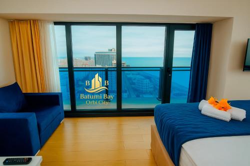 Postel nebo postele na pokoji v ubytování Batumi Bay * Orbi City *