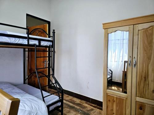 Ένα ή περισσότερα κρεβάτια σε δωμάτιο στο Kinyanjui's homes 004