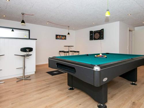 a billiard room with a pool table in it at 5 star holiday home in Ebeltoft in Ebeltoft