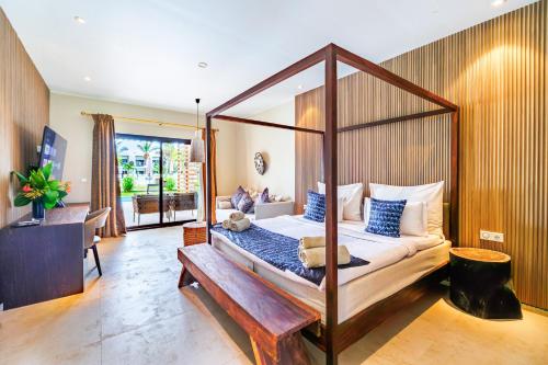 Ένα ή περισσότερα κρεβάτια σε δωμάτιο στο Tamala Beach Resort