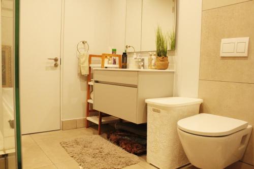 Koupelna v ubytování Ellipse waterfall self Catering Hotel