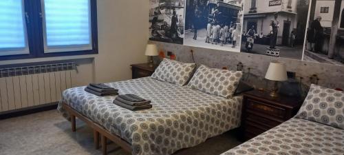 Postel nebo postele na pokoji v ubytování LA FONTANA FIORITA 2