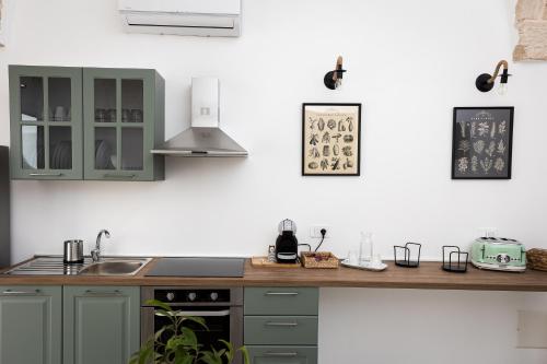 Η κουζίνα ή μικρή κουζίνα στο Le Dimore di Nonna Nina