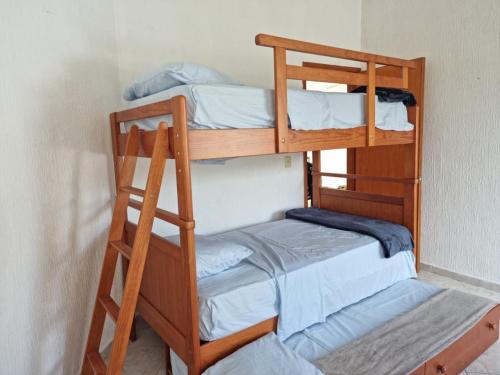 Postel nebo postele na pokoji v ubytování SoL Luna