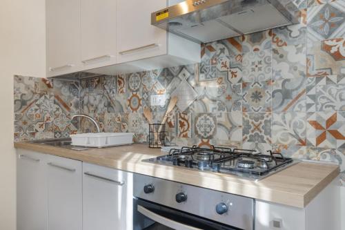 Kuchyň nebo kuchyňský kout v ubytování Conca D'Oro Guest House - Elisabetta