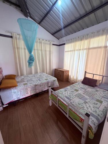 Voodi või voodid majutusasutuse Acogedora casa de campo y naturaleza toas