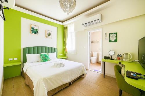 Ένα ή περισσότερα κρεβάτια σε δωμάτιο στο 迎曦醉月主題民宿