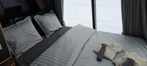 Postel nebo postele na pokoji v ubytování Skogshotell