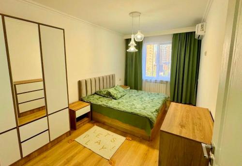 Ένα ή περισσότερα κρεβάτια σε δωμάτιο στο Modern Apartment In Yerevan by Republic squer