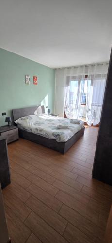 Postel nebo postele na pokoji v ubytování Casa Laetitia