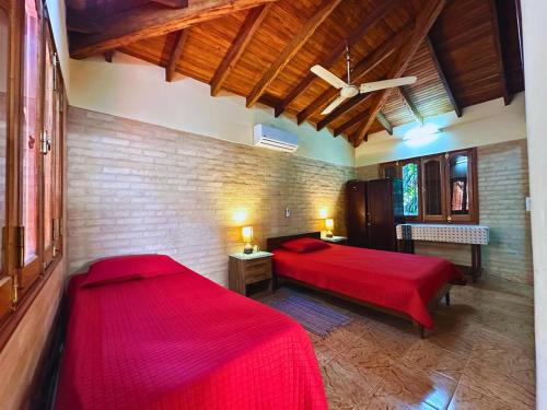 Postel nebo postele na pokoji v ubytování Casa Quinta en Ñemby