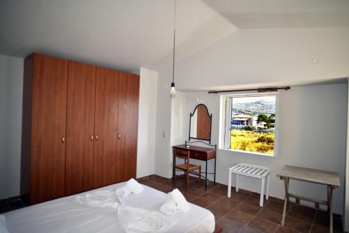 Postel nebo postele na pokoji v ubytování Βεατρικη Beatrice