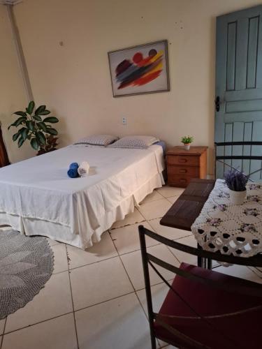 Postel nebo postele na pokoji v ubytování Suíte Cama Queen perto Centro Histórico e Praias