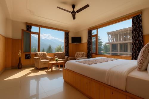 Ένα ή περισσότερα κρεβάτια σε δωμάτιο στο The Suraj Cottage Manali ! Private Parking ! Bonfire ! Playing Zone ! Near Mall Road