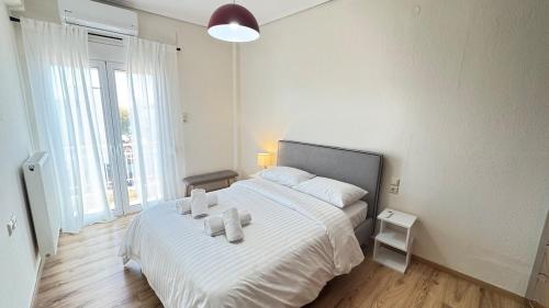 Ένα ή περισσότερα κρεβάτια σε δωμάτιο στο eLHria