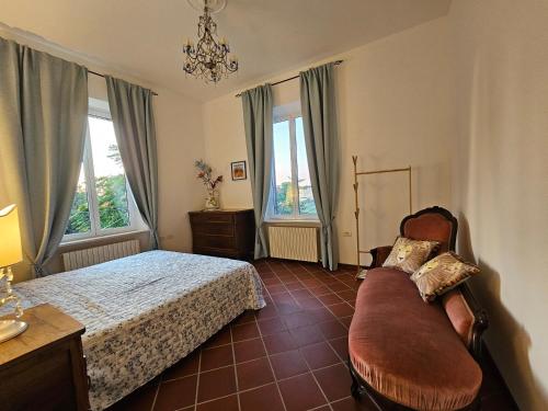 Ένα ή περισσότερα κρεβάτια σε δωμάτιο στο Villa Carla