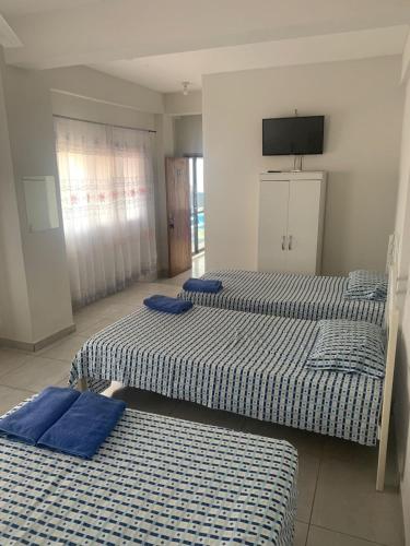 Ένα ή περισσότερα κρεβάτια σε δωμάτιο στο Hotel Las Colonias