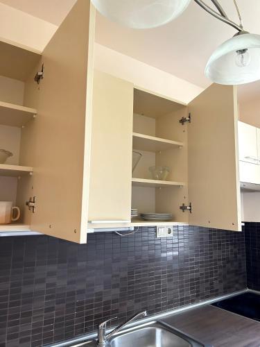 Kuchyň nebo kuchyňský kout v ubytování Szántó Prime Residence