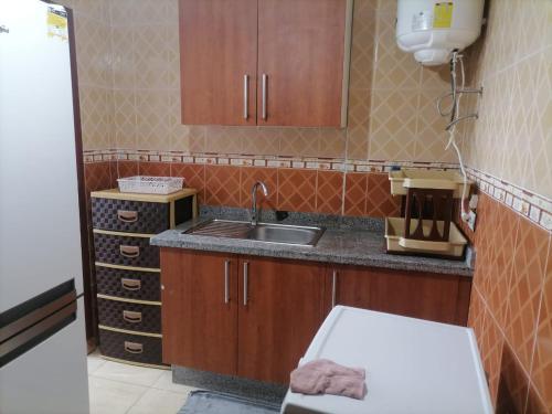 Η κουζίνα ή μικρή κουζίνα στο Oualidia résidence Ben zeroual