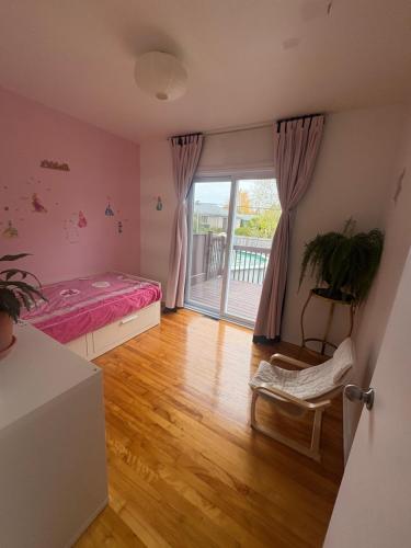 Voodi või voodid majutusasutuse Escapade familiale à Longueuil toas